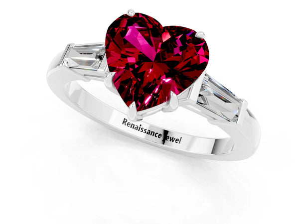 Silver Heart Cut Garnet Three-Stone Ring with Tapered Baguette Side Stones and Prong Setting