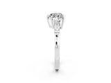 White gold Heart Cut Cut Diamond Ring with Tapered Baguette Side Stones in Four-Prong Setting_2