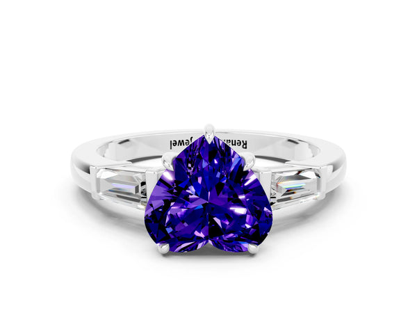 Silver Heart Cut Tanzanite Three-Stone Ring with Tapered Baguette Side Stones and Prong Setting