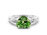 White gold Heart Cut Cut Diamond Ring with Tapered Baguette Side Stones in Four-Prong Setting