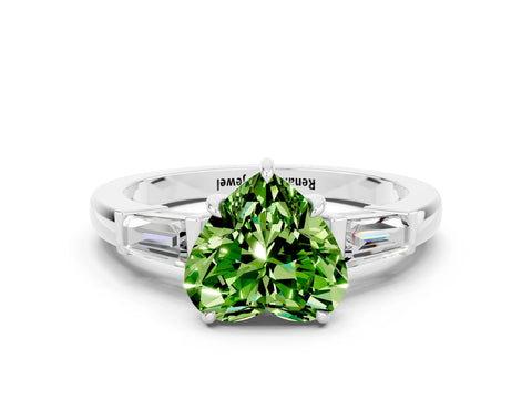 White gold Heart Cut Cut Diamond Ring with Tapered Baguette Side Stones in Four-Prong Setting