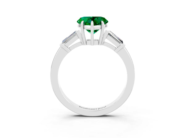 Silver Heart Cut Emerald Three-Stone Ring with Tapered Baguette Side Stones and Prong Setting