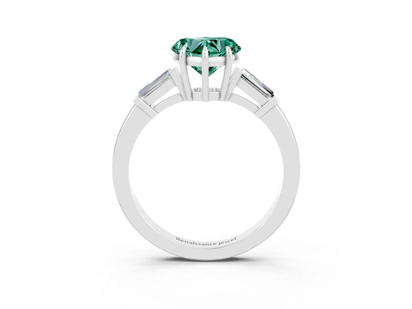 Silver Heart Cut Green Sapphire Three-Stone Ring with Tapered Baguette Side Stones and Prong Setting