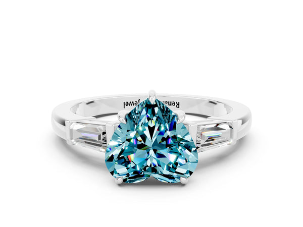 White gold Heart Cut Cut Diamond Ring with Tapered Baguette Side Stones in Four-Prong Setting