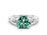 White gold Heart Cut Cut Diamond Ring with Tapered Baguette Side Stones in Four-Prong Setting