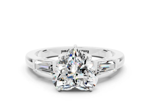 White gold Heart Cut Cut Diamond Ring with Tapered Baguette Side Stones in Four-Prong Setting