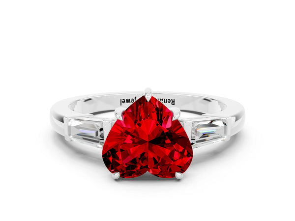 White gold Heart Cut Cut Diamond Ring with Tapered Baguette Side Stones in Four-Prong Setting