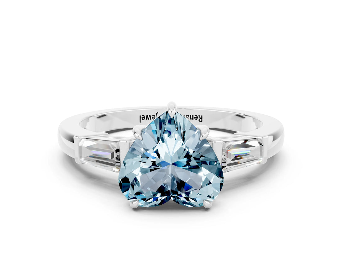 White gold Heart Cut Cut Diamond Ring with Tapered Baguette Side Stones in Four-Prong Setting