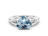 White gold Heart Cut Cut Diamond Ring with Tapered Baguette Side Stones in Four-Prong Setting