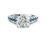 White gold Heart Cut Diamond Cathedral Solitaire Ring with Round with Blue Topaz side stone Pavé Band