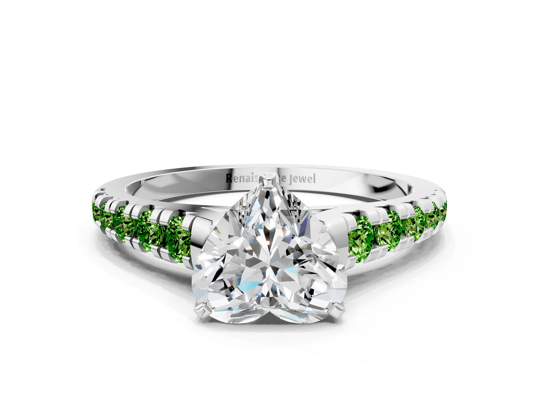 White gold Heart Cut Diamond Cathedral Solitaire Ring with Round with Peridot side stone Pavé Band