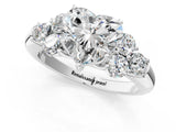 White gold Heart Cut Diamond Cluster Ring with Round Accent Stones and Prong Setting on a Classic Band_79
