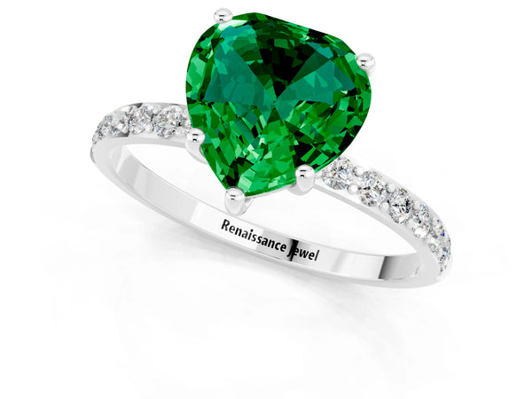 Platinum Heart Cut Emerald Solitaire Ring with Round Pavé Shoulders and Prong Setting
