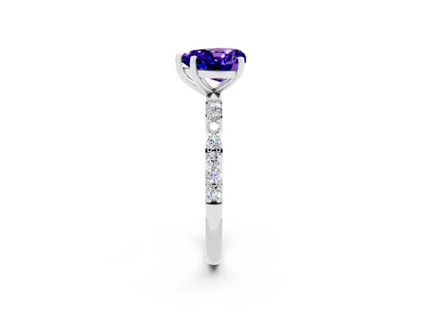 White gold Heart Cut Tanzanite Solitaire Ring with Round Pavé Shoulders and Prong Setting