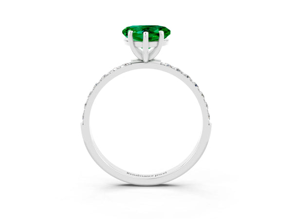 Platinum Heart Cut Emerald Solitaire Ring with Round Pavé Shoulders and Prong Setting