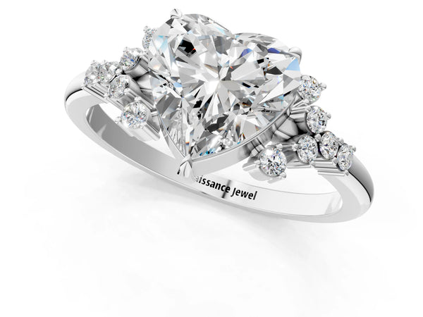 White gold Heart Cut Diamond Ring with Side Stones and Four-Prong Setting