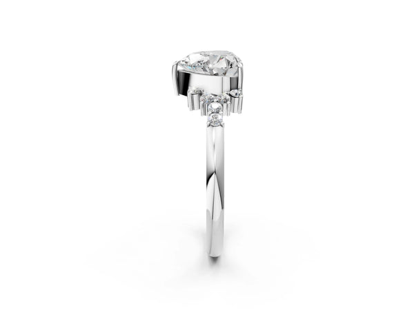 White gold Heart Cut Diamond Ring with Side Stones and Four-Prong Setting