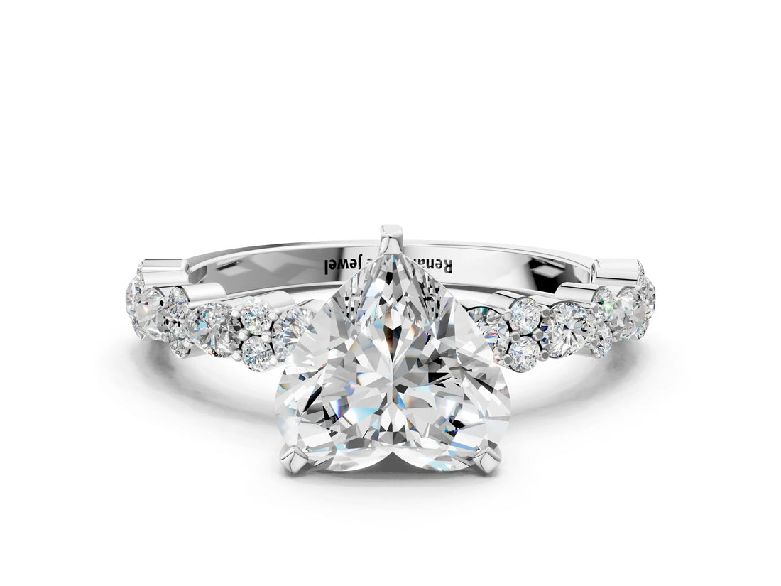 White gold Heart Cut Diamond Side Stone Solitaire Ring with Round with Moissanite side stone and Four-Prong Setting