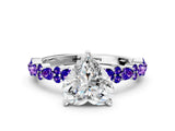 White gold Heart Cut Diamond Side Stone Solitaire Ring with Round with Tanzanite side stone and Four-Prong Setting