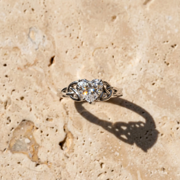 White gold Heart Cut Diamond Solitaire Engagement Ring with Celtic Knot Band and Four-Prong Setting