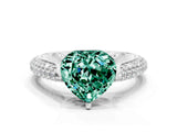 White gold Heart Cut Diamond Solitaire Engagement Ring with Pavé Band and Four-Prong Setting