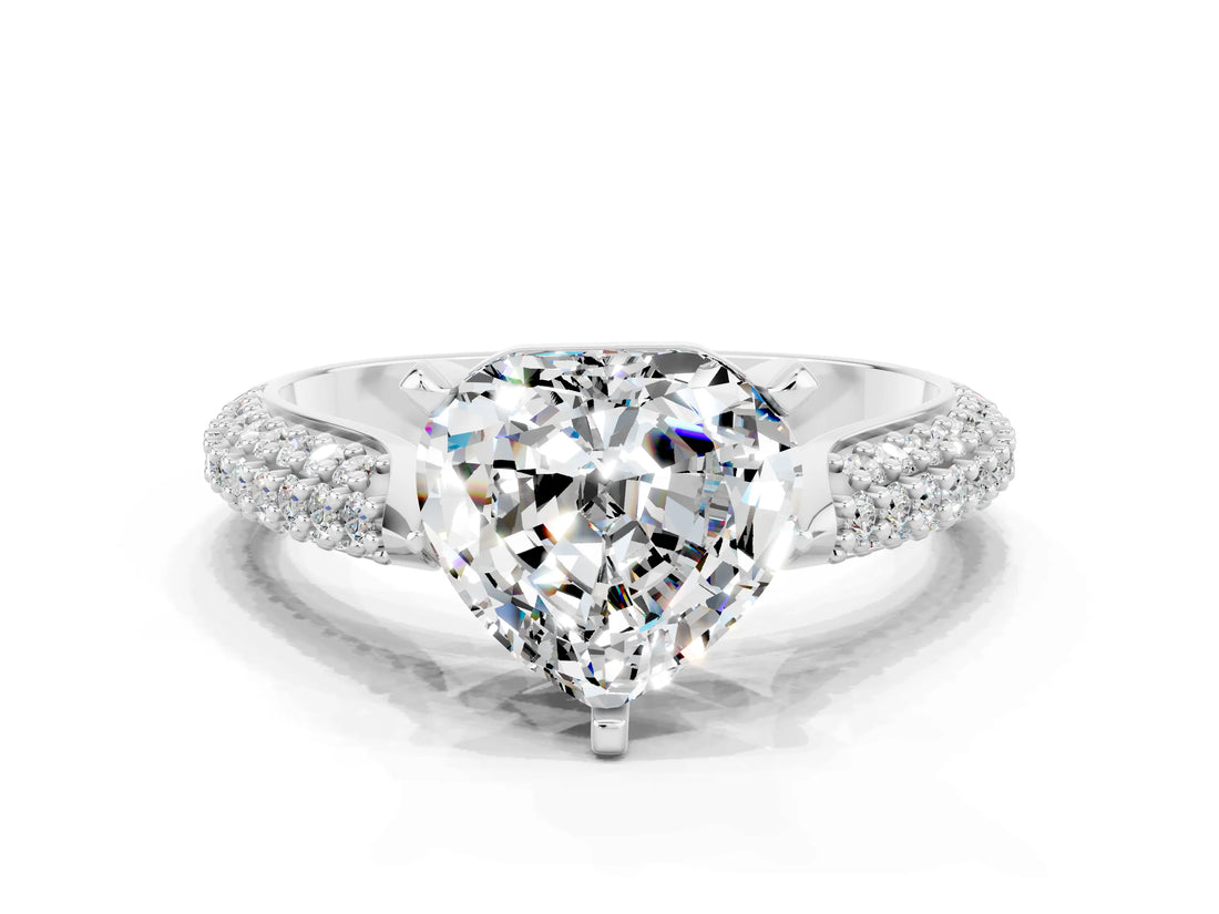 White gold Heart Cut Diamond Solitaire Engagement Ring with Pavé Band and Four-Prong Setting