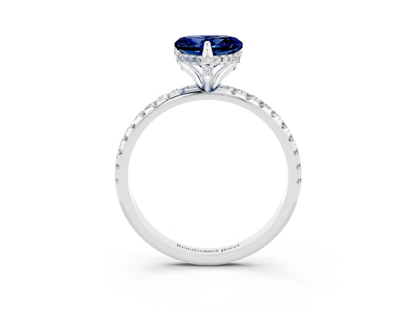 Platinum Heart Cut Blue Sapphire Hidden Halo Engagement Ring with Round Pavé Band and Prong Setting