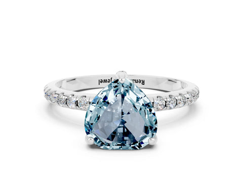 White gold Heart Cut Diamond Solitaire Ring with Four-Prong Setting and Pavé Band