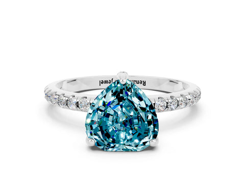 White gold Heart Cut Diamond Solitaire Ring with Four-Prong Setting and Pavé Band