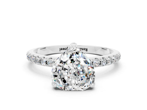 White gold Heart Cut Diamond Solitaire Ring with Four-Prong Setting and Pavé Band