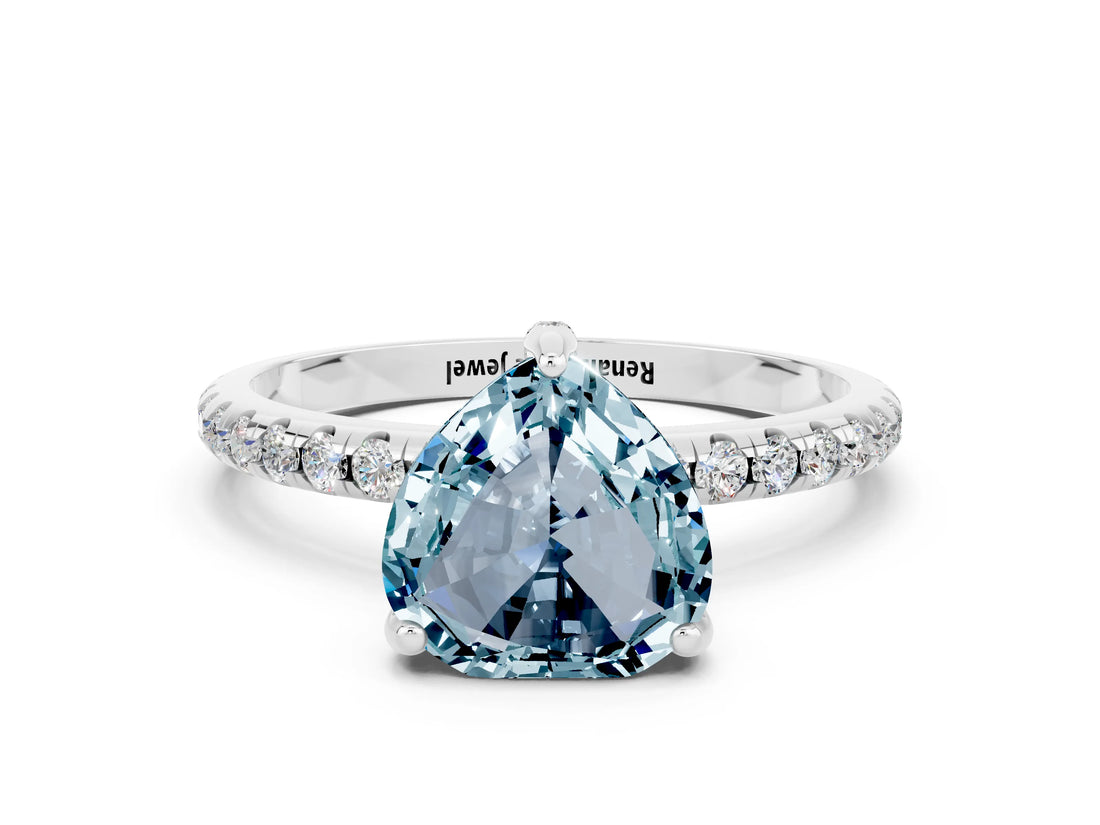 White gold Heart Cut Diamond Solitaire Ring with Four-Prong Setting and Pavé Band