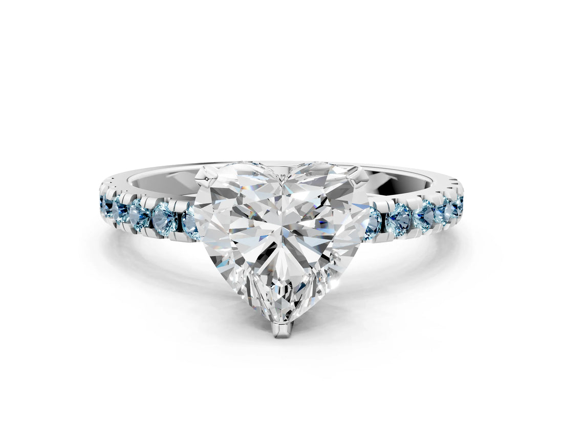 White gold Heart Cut Diamond Solitaire Ring with Round with Aquamarine side stone Pavé Band and Four-Prong Setting