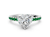 White gold Heart Cut Diamond Solitaire Ring with Round with Emerald side stone Pavé Band and Four-Prong Setting