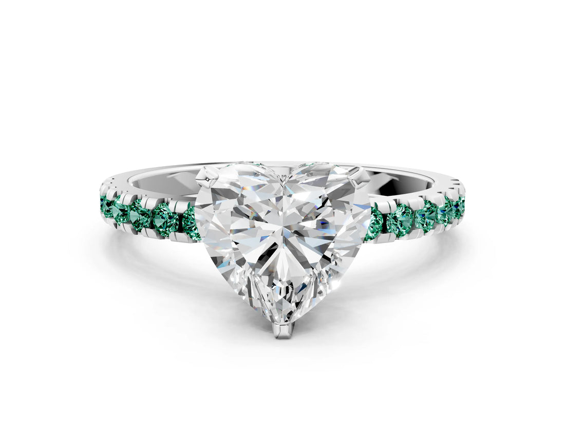 White gold Heart Cut Diamond Solitaire Ring with Round with Green Sapphire side stone Pavé Band and Four-Prong Setting