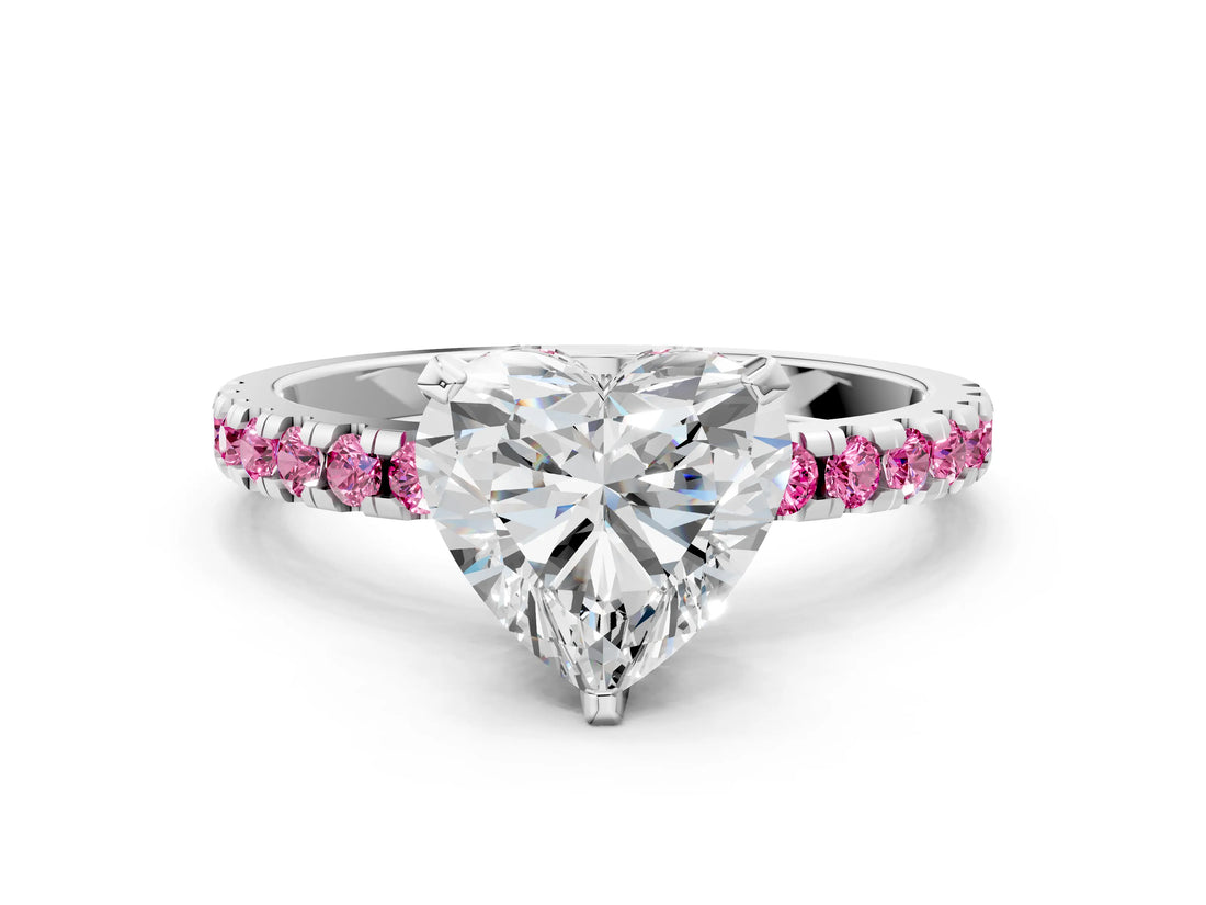 White gold Heart Cut Diamond Solitaire Ring with Round with Pink Sapphire side stone Pavé Band and Four-Prong Setting