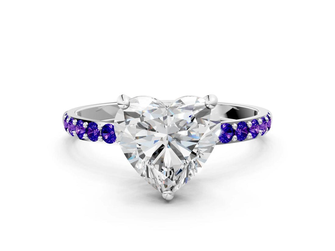White gold Heart Cut Diamond Solitaire Ring with Round with Tanzanite side stone Pavé Band and Prong Setting