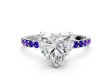 White gold Heart Cut Diamond Solitaire Ring with Round with Tanzanite side stone Pavé Band and Prong Setting