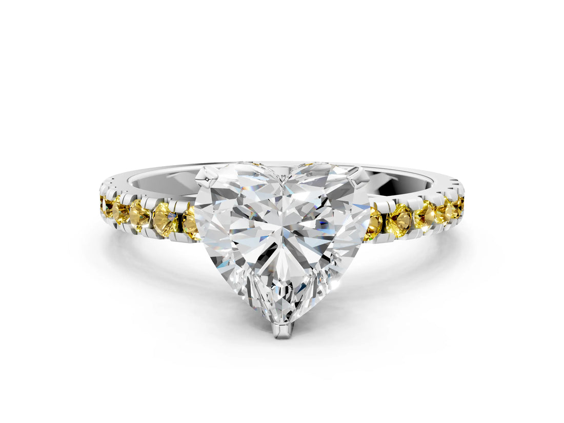 White gold Heart Cut Diamond Solitaire Ring with Round with Yellow Sapphire side stone Pavé Band and Four-Prong Setting