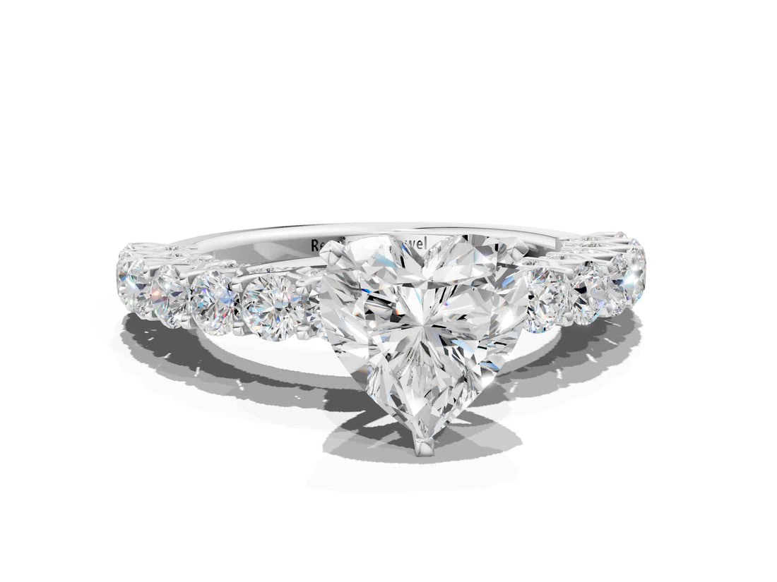 White gold Heart Cut Diamond Solitaire Ring with Shared Prong Pavé Band and Four-Prong Setting_124