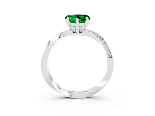 White gold Heart Cut Emerald Engagement Ring with Side Stone Accents and Four-Prong Setting