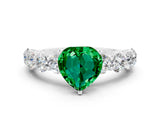 White gold Heart Cut Emerald Prong Setting with Side Stones on a Pave Band