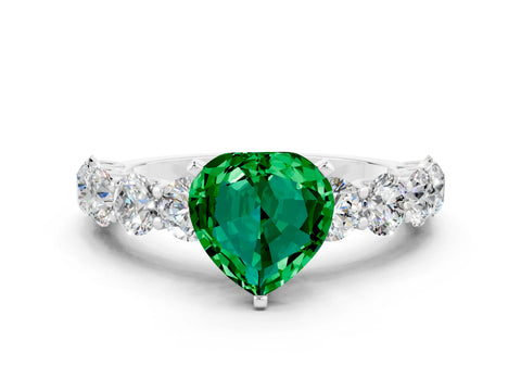 White gold Heart Cut Emerald Prong Setting with Side Stones on a Pave Band