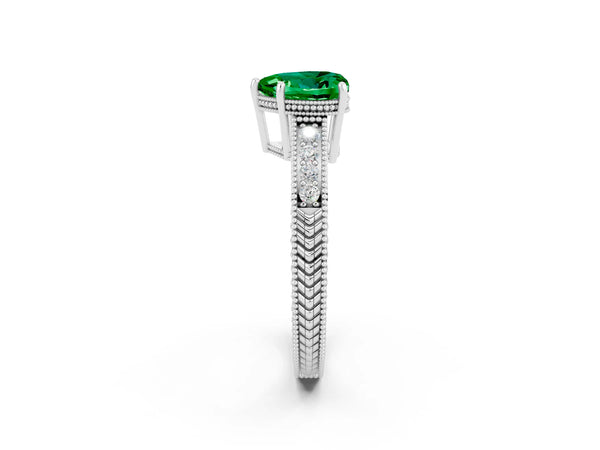 Platinum Heart Cut Emerald Ring with Milgrain Pavé Band and Four-Prong Setting