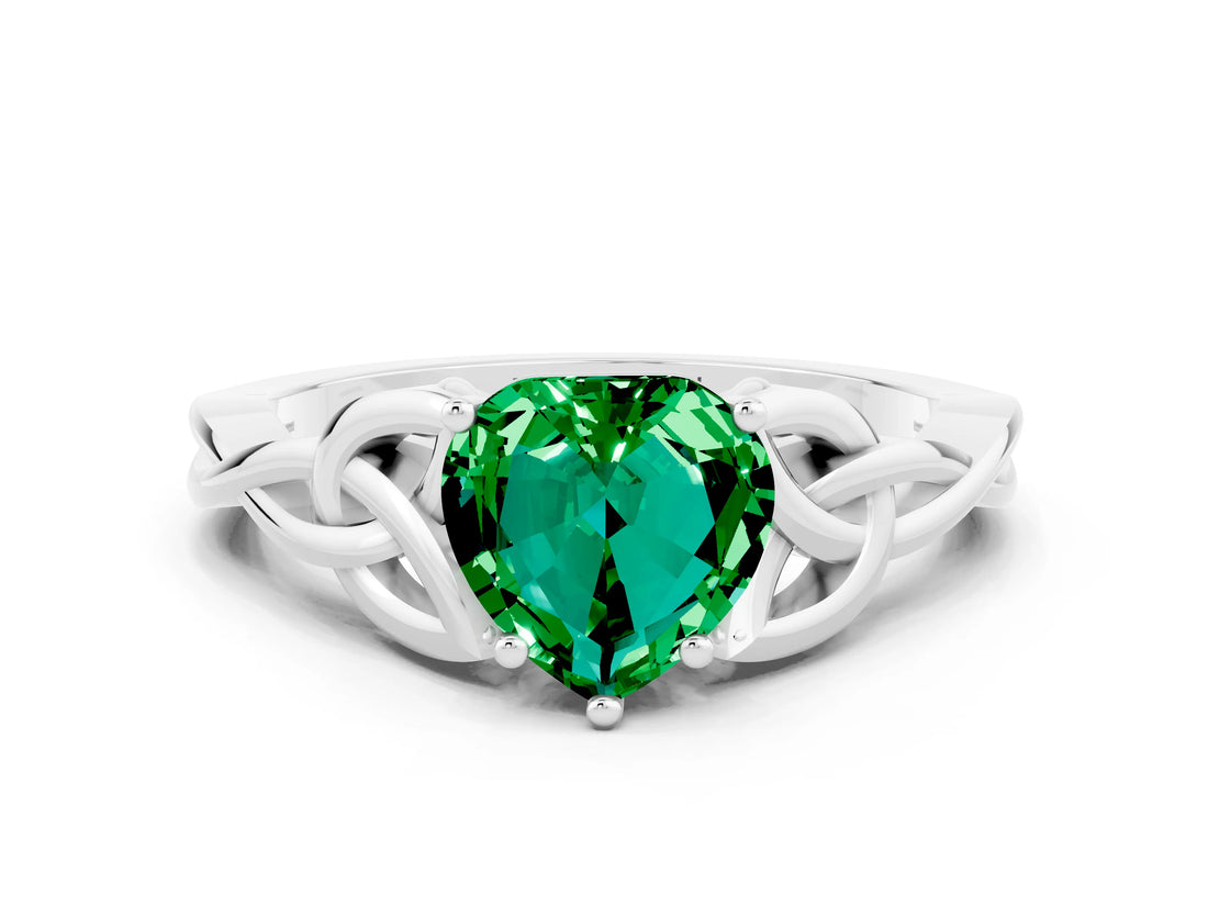 White gold Heart Cut Emerald Solitaire Engagement Ring with Celtic Knot Band and Four-Prong Setting
