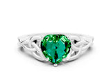 White gold Heart Cut Emerald Solitaire Engagement Ring with Celtic Knot Band and Four-Prong Setting