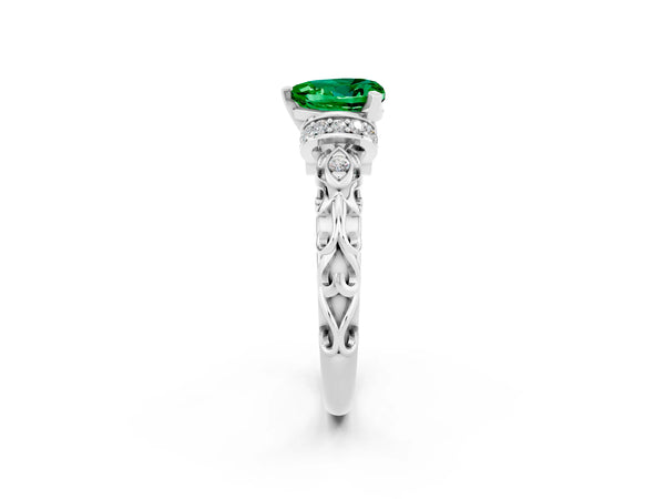 Silver Heart Cut Emerald Solitaire Ring with Filigree Band and Four-Prong Setting