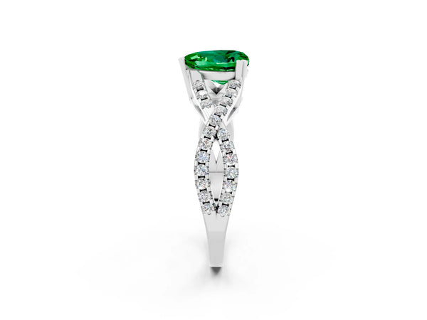 White gold Heart Cut Emerald Solitaire Ring with Four-Prong Setting and Twisted Pavé Band
