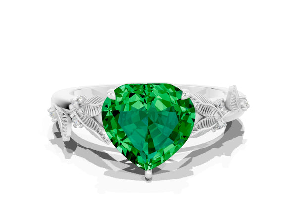 Platinum Heart Cut Emerald Solitaire Ring with Leaf Motif Band and Four-Prong Setting