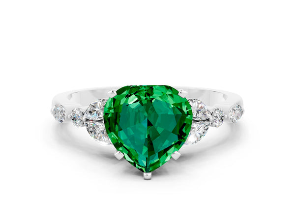 White gold Heart Cut Emerald Solitaire Ring with Side Stones and Four-Prong Setting