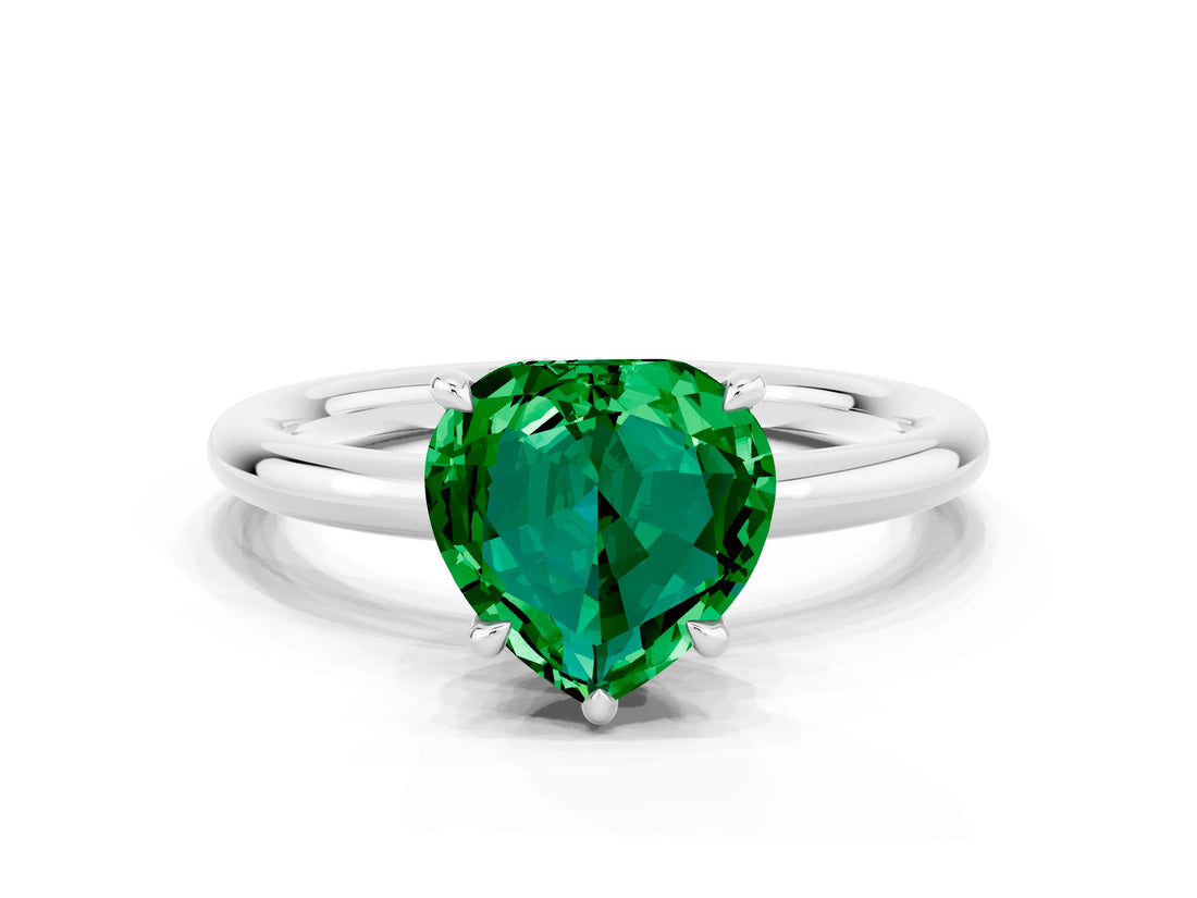 White gold Heart Cut Emerald Solitaire Ring with Thin Band and Four-Prong Setting